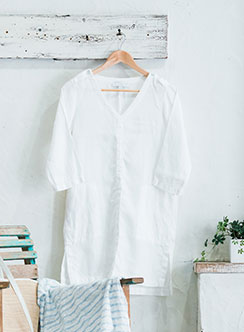 洋服と向き合うクリーニング